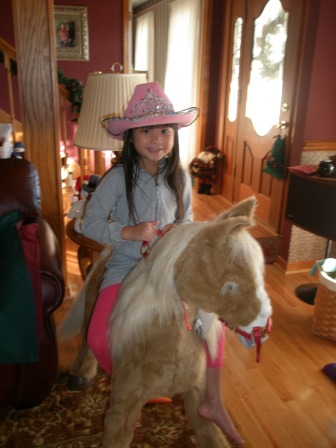 Kasen playing cowgirl